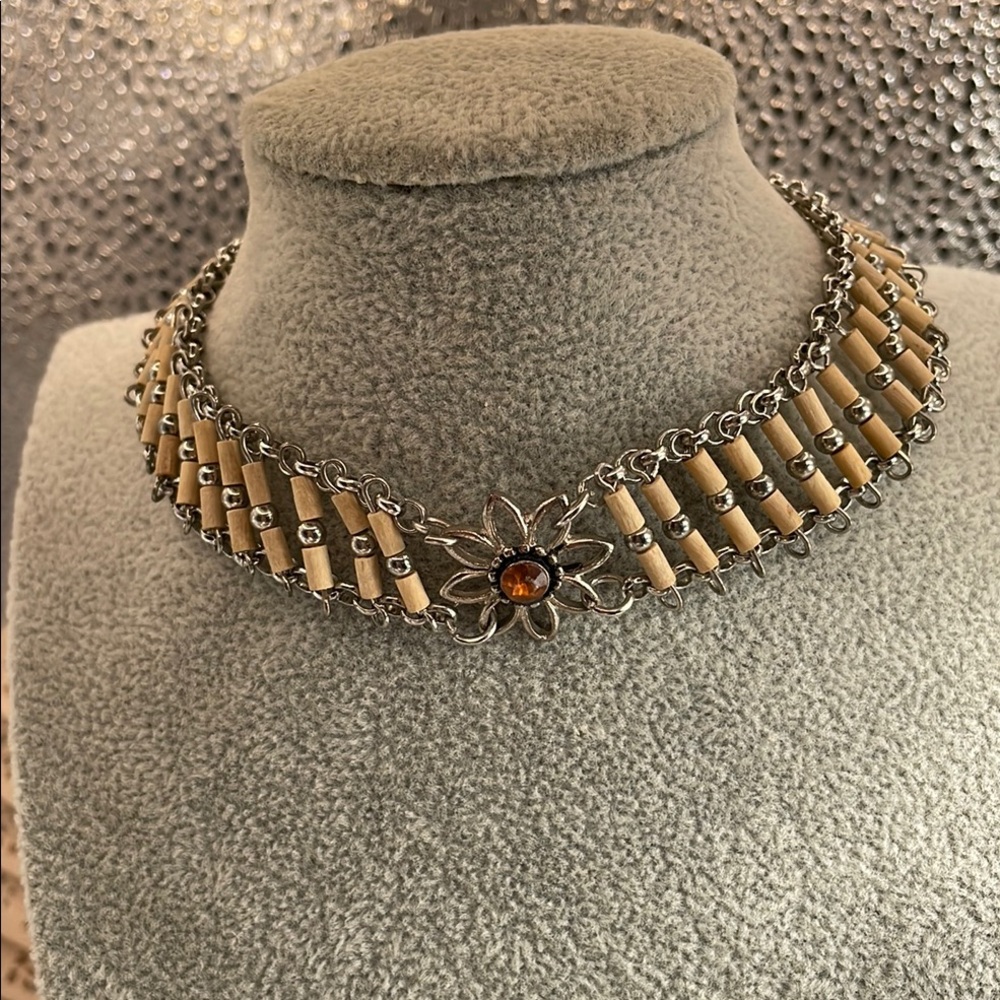 Chocker necklace light wood  beads and silver with a flower design